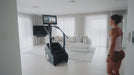 Video demonstration of various athletes using the STEPR+ Stair Climber in different settings, showcasing promotional and functional features, including accessibility, touchscreen use, and workout versatility.